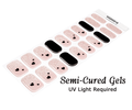 Sheet of 20 semi-cured gel nail wraps with black heart designs on a white background
