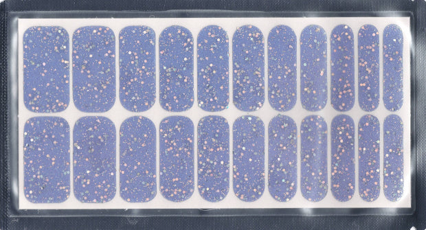 Sheet of 22 blue nail stickers with irridescent glitter in a clear packaging