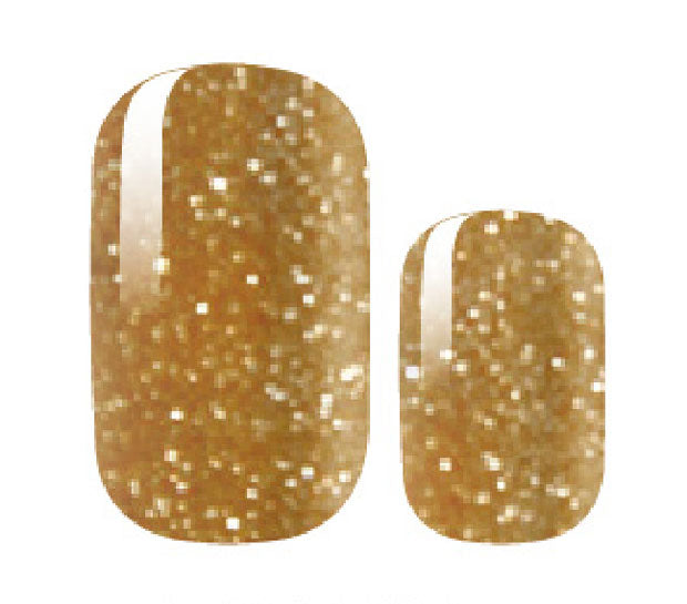 Sample image of glittery gold nail wraps.