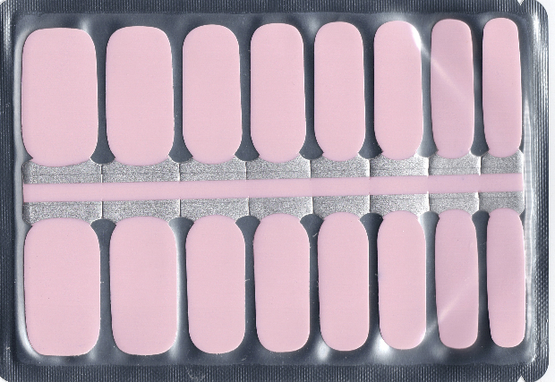 Pink adhesive patches in a clear plastic packaging