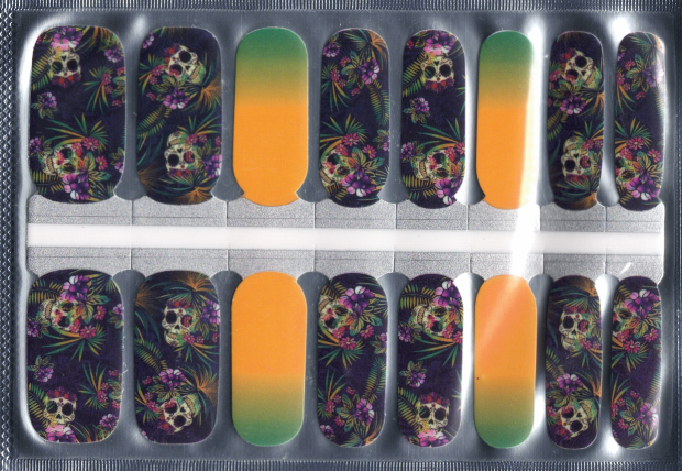 Nail art stickers with skull and floral designs on a gradient orange to green background.