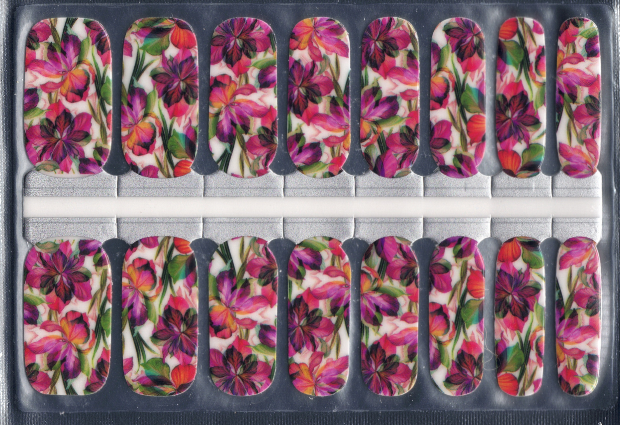 Set of 16 colorful floral nail wraps in a sealed package.