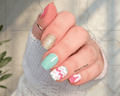Hand with colorful easter nail art  nail wraps