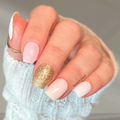 Soft pink and white nail wraps with champagne gold glitter accent nails, Ballet & Bubbly by Canadian nail wrap brand Hanny and Chuck.