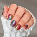 Borrowed Sunshine rainbow glitter nail wraps on short square nails featuring pink, blue, gold, green, and purple sparkle by Hanny & Chuck Canada