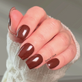 Glossy chocolate brown nail wraps on short square nails, rich neutral manicure