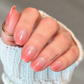 Coral Mist sheer white-to-coral ombré nail polish wraps on natural nails.