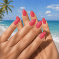 Creamy tropical pink nail wraps against a sunny beach backdrop