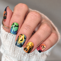 Dark Familiar colourful Halloween nail wraps with bats pumpkins spooky trees and haunted scenes