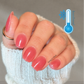Magic Peach nail wraps in cold state showing warm peach pink colour on hand