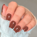 Melted Cocoa nail wraps: glossy chocolate brown manicure on medium skin tone with gold jewelry detail