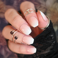 Milky white ombre nail wraps on short square nails with glossy finish