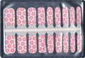 Pink donut kids nail wraps with colourful sprinkles on a soft cream background