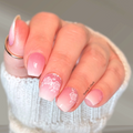 Once Upon a Rose pink floral nail wraps with soft ombré tips, white rose accents, and glossy manicure shown on nails in Canada