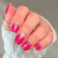 Pink ombré glitter nail wraps with silver glitter at the cuticle on short square nails, glossy finish