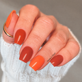 Pumpkin Spice Loading nail wraps on short square nails.