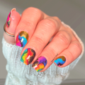 Statement Piece colourful abstract nail wraps with rainbow, black, and gold accents on nails