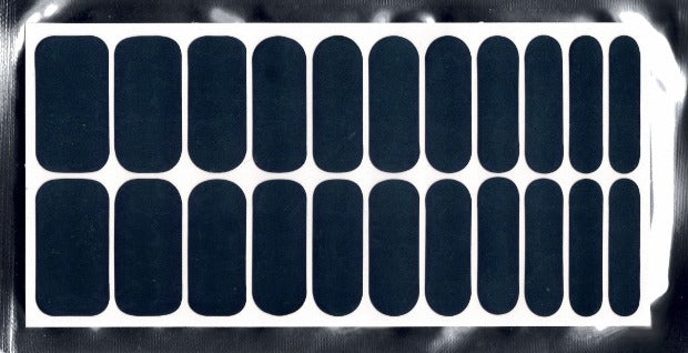 An image of 22 dark green nail slides in a silver package.