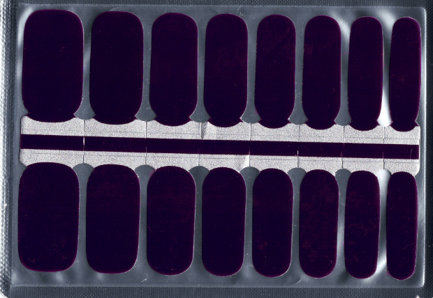 A package of 16 very dark purple nail wraps
